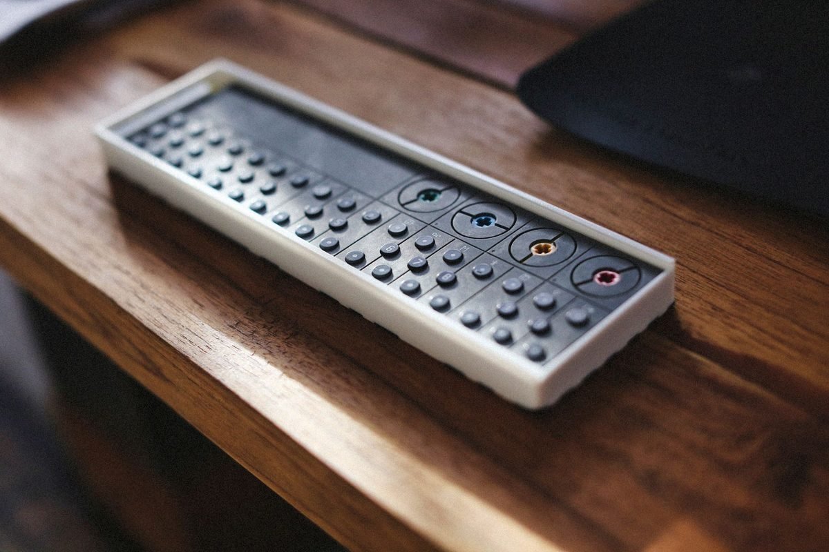 remote control resting on a wooden table