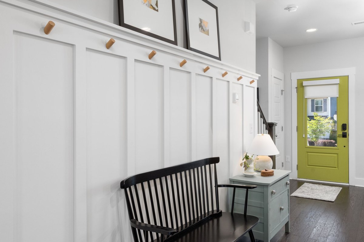 renter-friendly small entryway storage with wall hooks and a bench