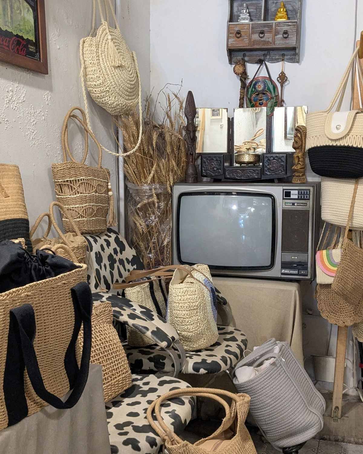 wicker baskets stored on open shelves in a living room